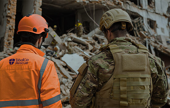 Emergency responders assess the destruction of a collapsed building, showcasing teamwork and vital recovery efforts in a disaster-stricken area.